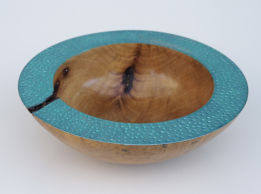 Turned wooden bowl textured and painted