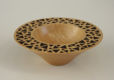 Turned wooden bowl with pyrographed rim